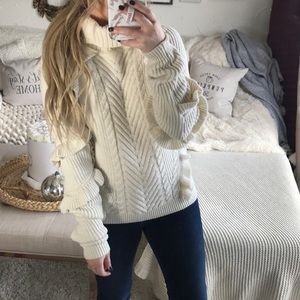 Cream ruffle turtleneck sweater